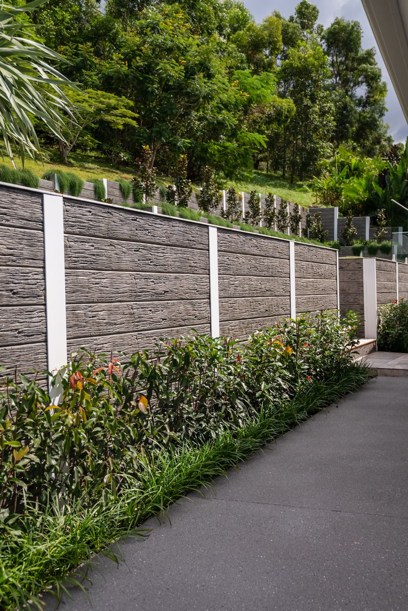 Finished concrete sleeper retaining wall with gardens