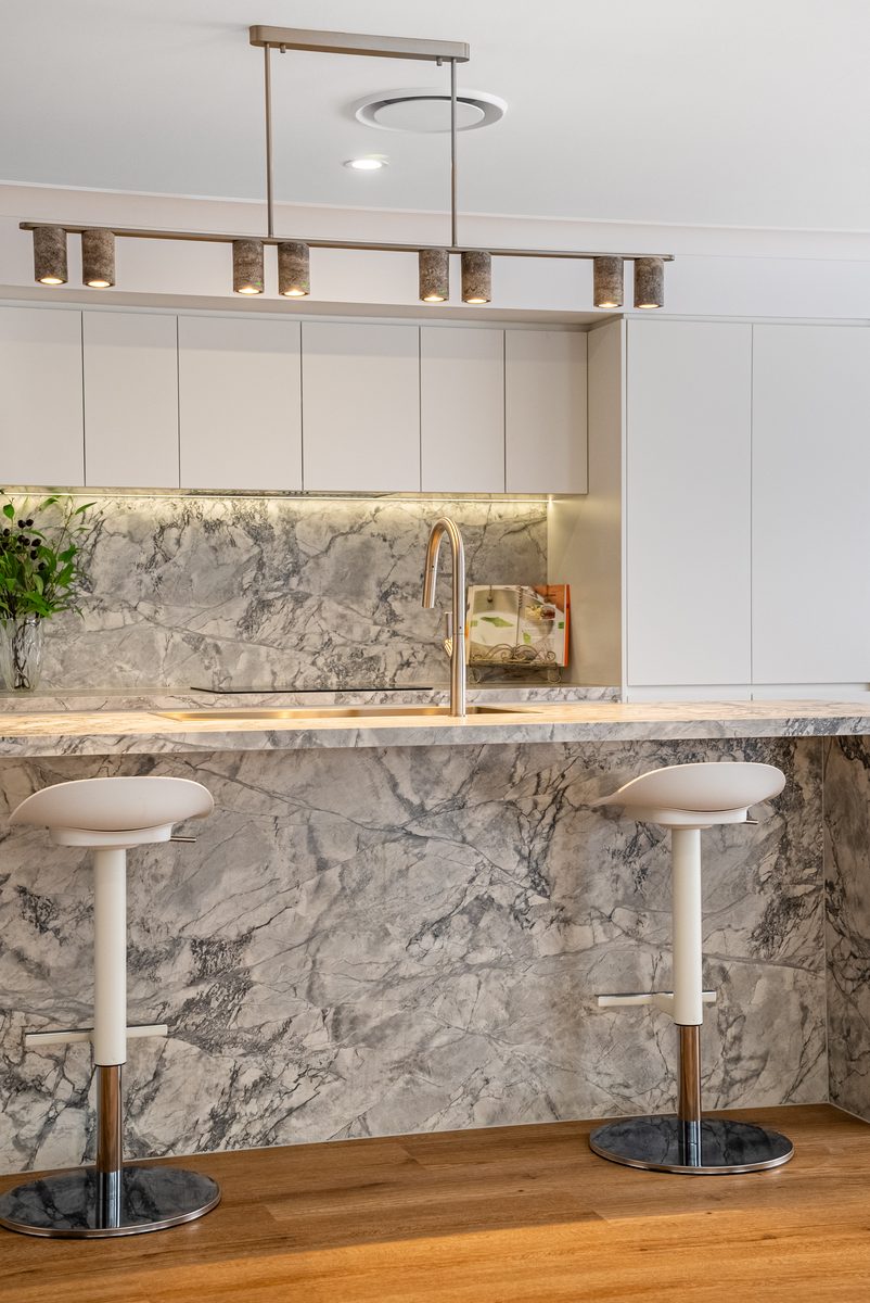 Marble breakfast bar and pendant lighting