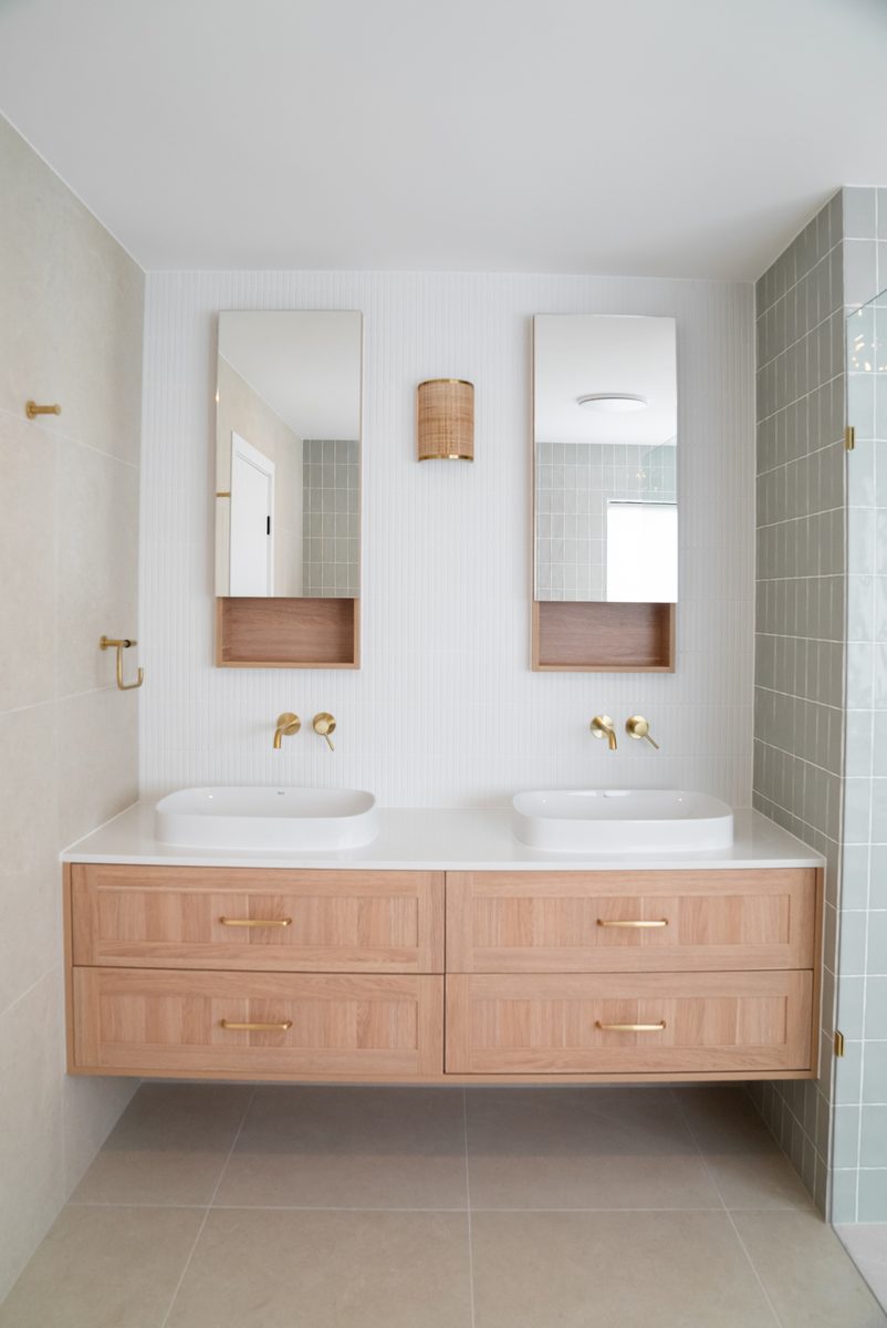 Twin timber vanity with brass tapware