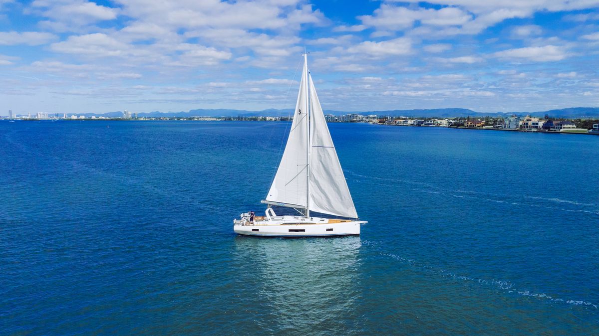 Yacht sailing wide aerial