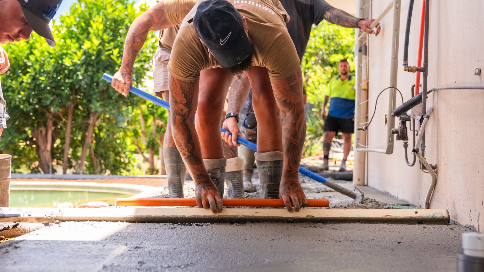 Ground Break Group crew screeding a fresh concrete pour